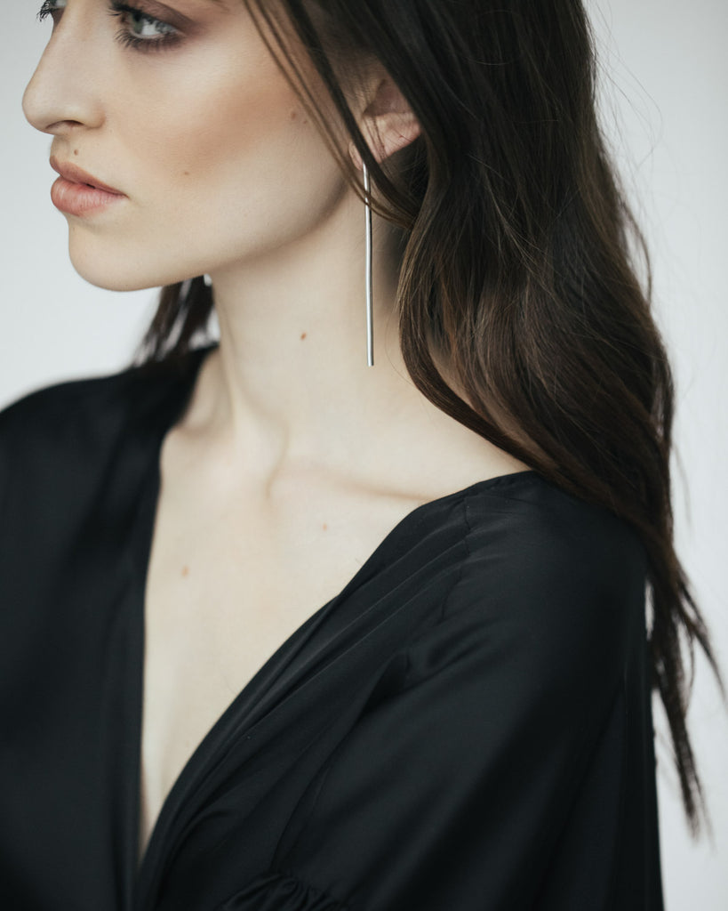 Large minimalist tube earrings.