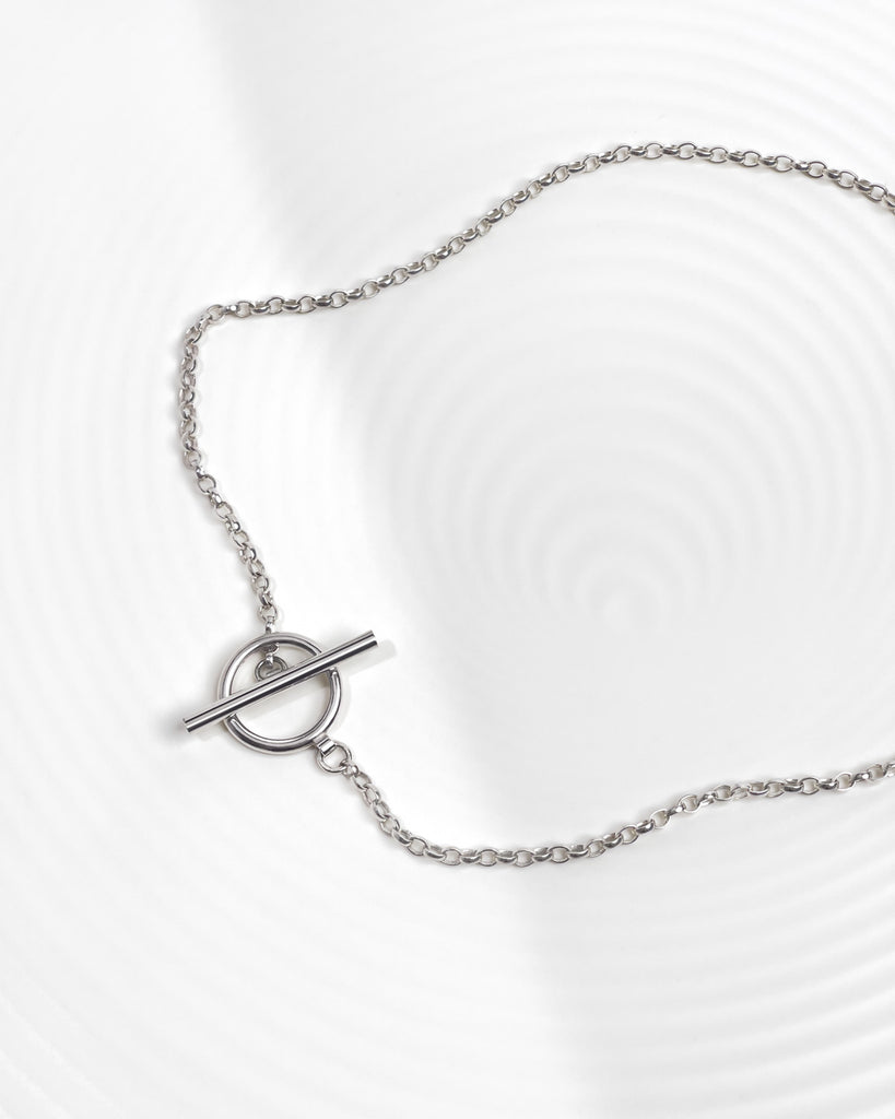 Minimalist chain necklace with custom toggle clasp.