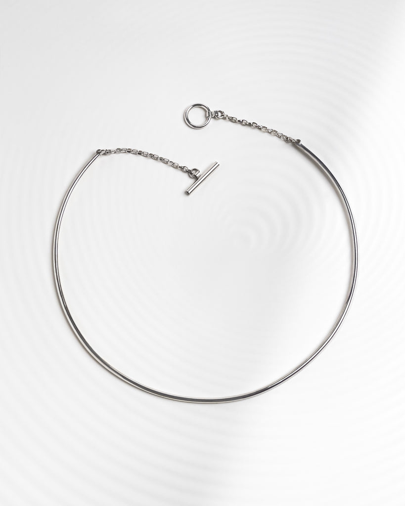 Minimalist chocker necklace with custom toggle clasp.