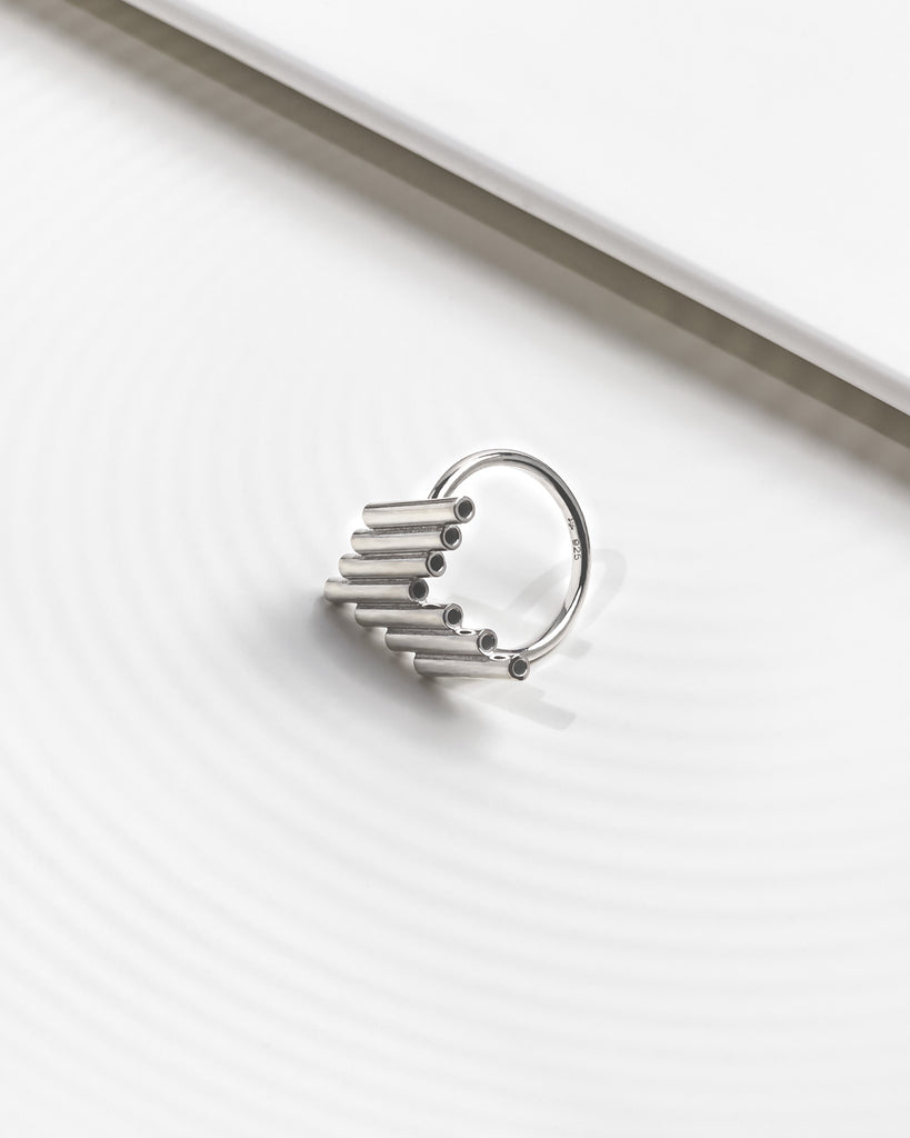 Statement ring with "V" shaped accent element.
