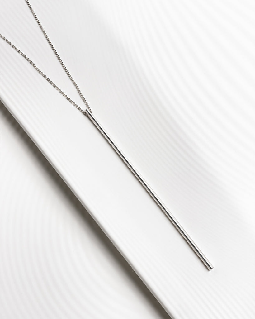 Contemporary statement long tube necklace.